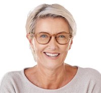 Smiling, mature woman with dentures