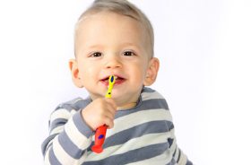 young boy with toothbrush