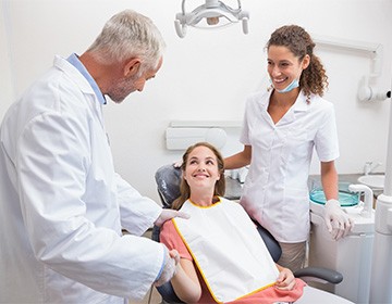 Auburn dental team members outside of dental office