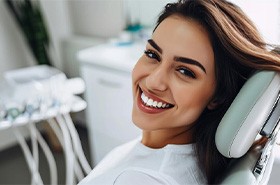 Close-up portrait of smiling female dental patient