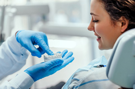 Dental patient listening to her dentist’s instructions