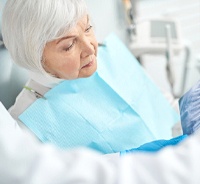 Dentist and patient discussing candidacy for dental implants