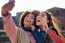 Female friends taking a selfie together