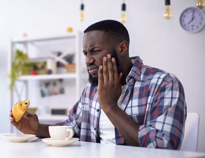 Man with tooth pain