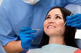 Woman receiving dental treatment