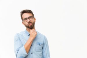 Man wearing curious, thoughtful expression